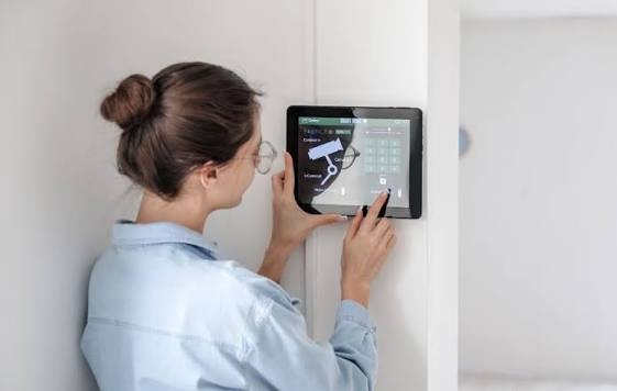 Wall-mounted smart home touchscreen used to control connected devices Wall-mounted smart home touchscreen used to control connected devices